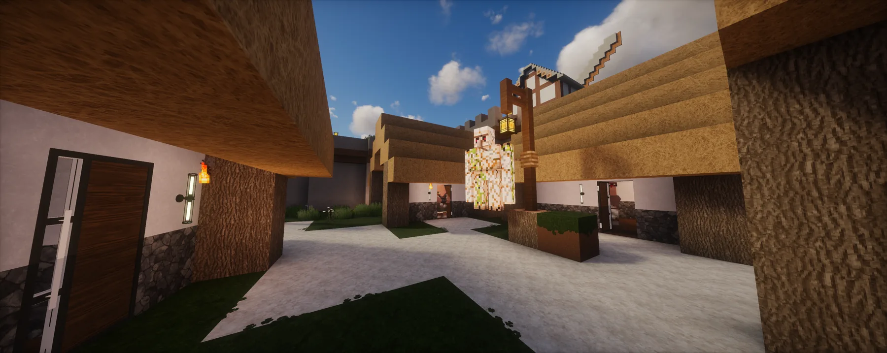 Street-level view of town builds on the TrainDontStop Minecraft server.